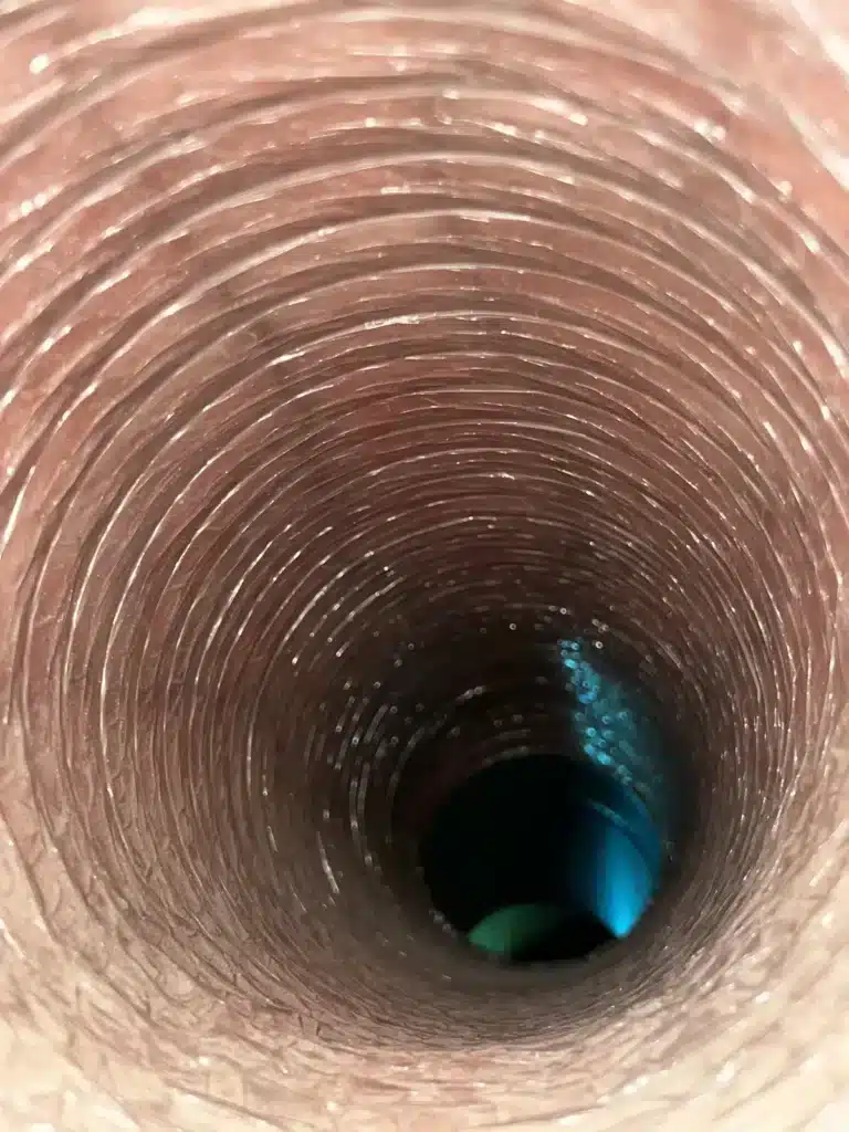 Air duct cleaning after shot: smooth, dust-free interior of a flexible duct run
