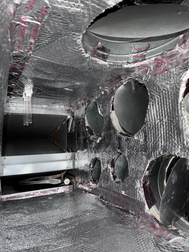 Newly insulated plenum interior after cleaning and sealing