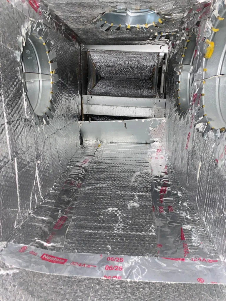 Plenum box repair: rebuilt plenum with new foil insulation and taped seams facing the coil opening